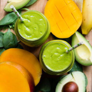 two glasses of avocado banana smoothie.