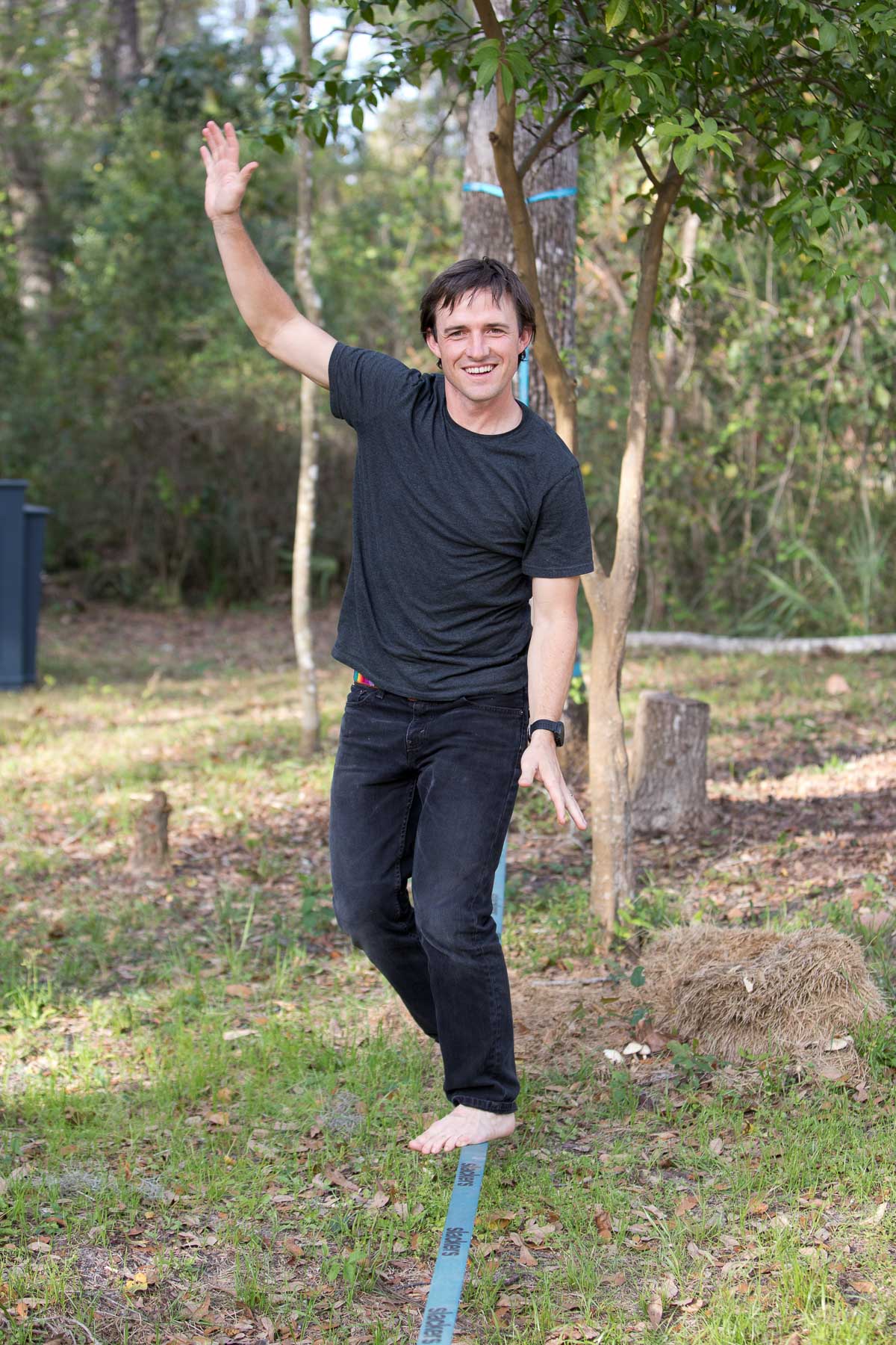 A man balancing on a slackline