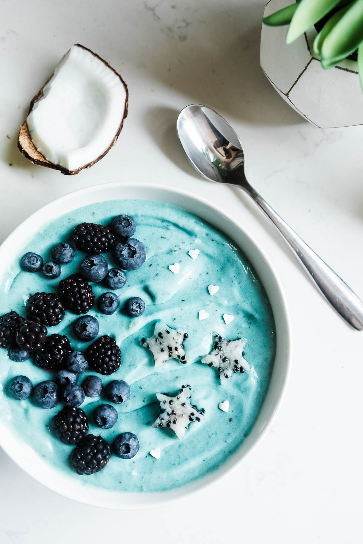 dairy-free ice cream made with frozen bananas and topped with fresh fruit.