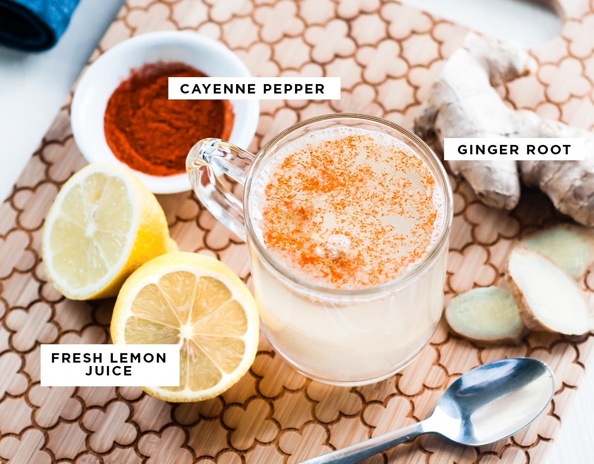 Labeled ingredients for the best detox tea recipe, including cayenne pepper, ginger root, and fresh lemon juice, all in white boxes with black text.