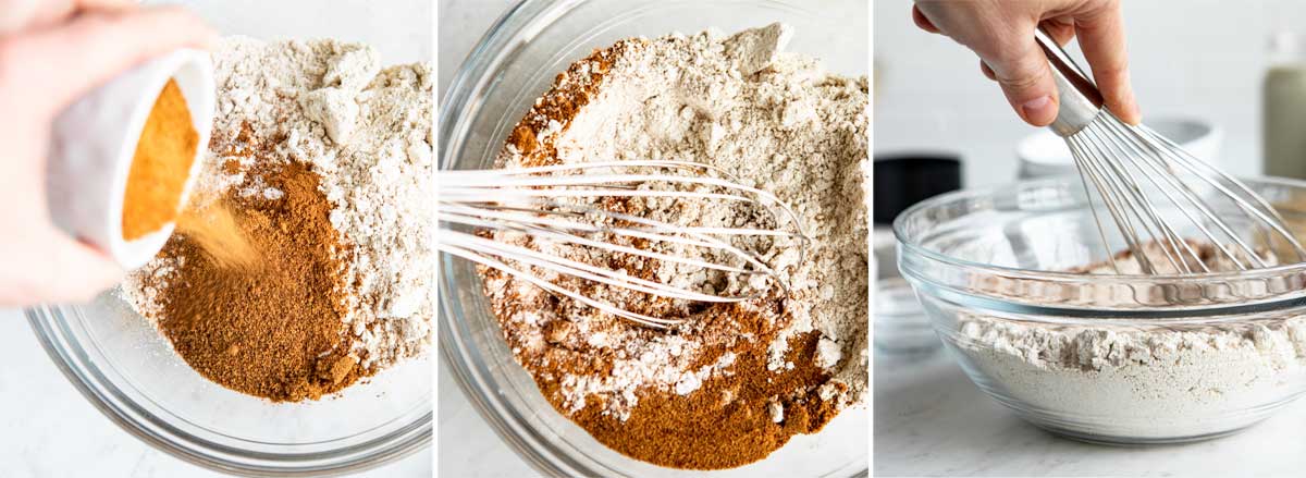 whisking dry ingredients together in a glass bow with a stainless steel whisk.