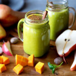 Butternut squash smoothie recipe on table.