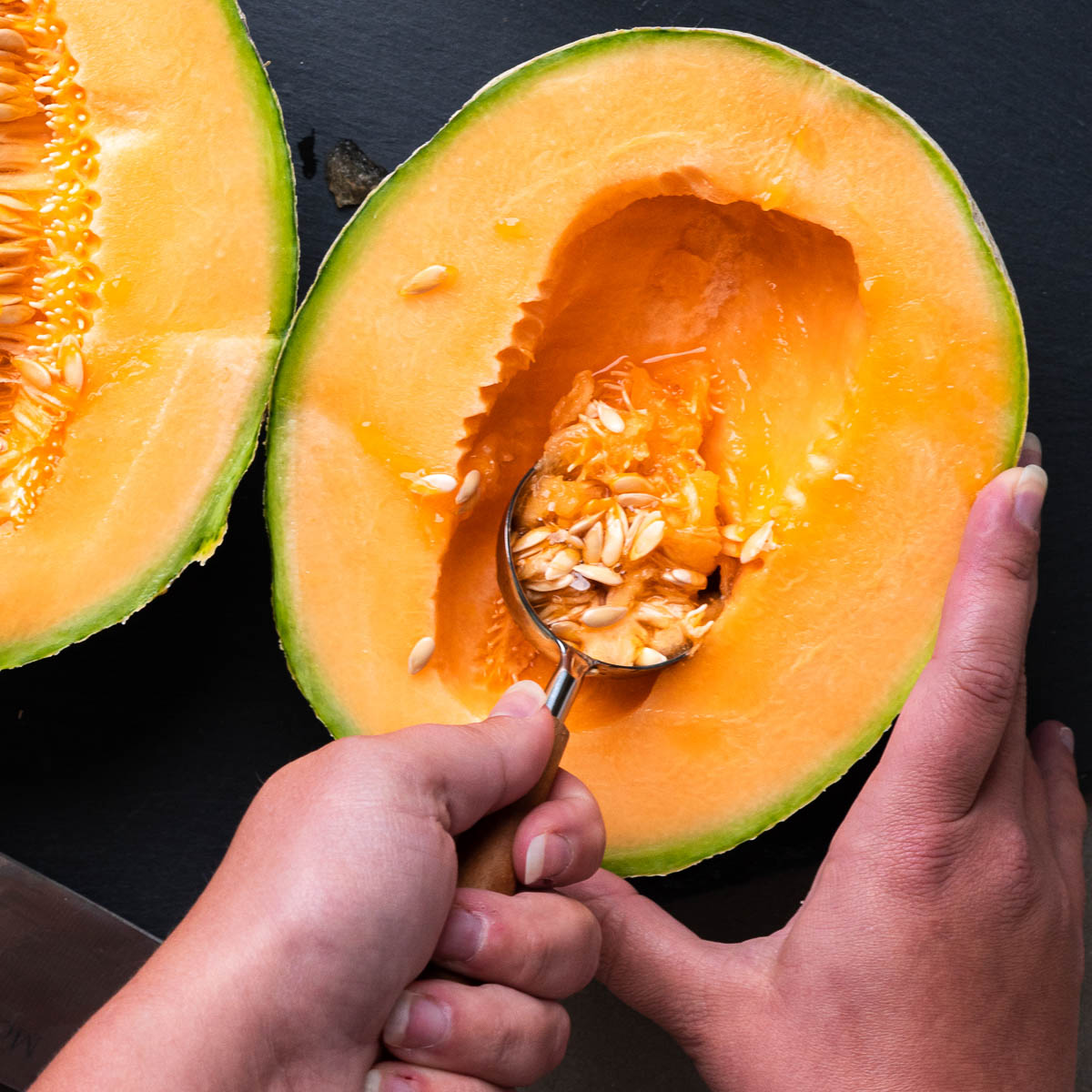 how to cut a cantaloupe steps: scoop out the seeds