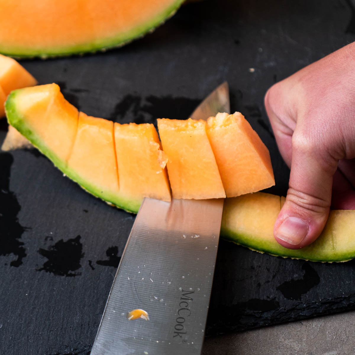 how to cut a cantaloupe steps: dice off the rind.