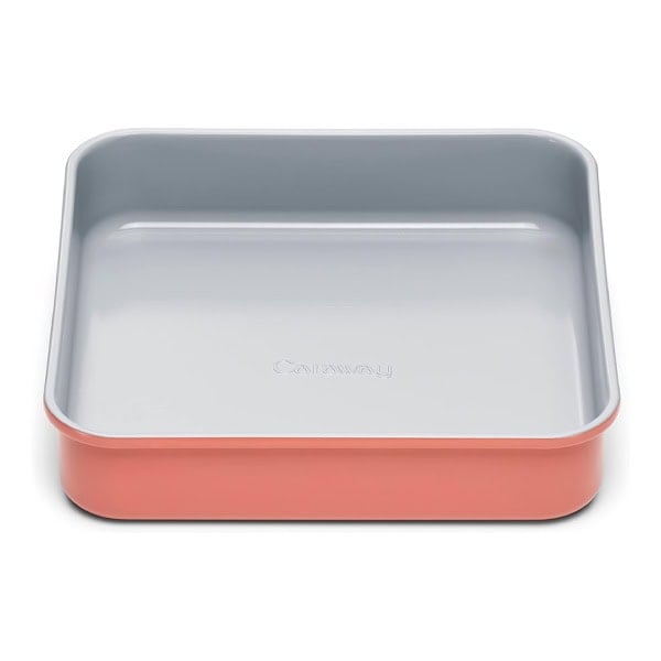 Coral and gray rectangular food storage container for kitchen use.
