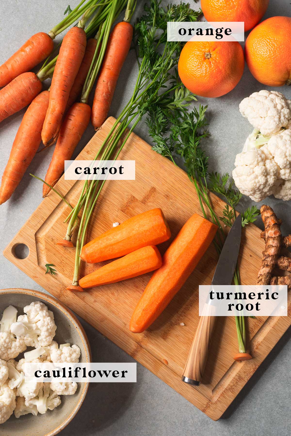 Ingredients for homemade carrot turmeric juice