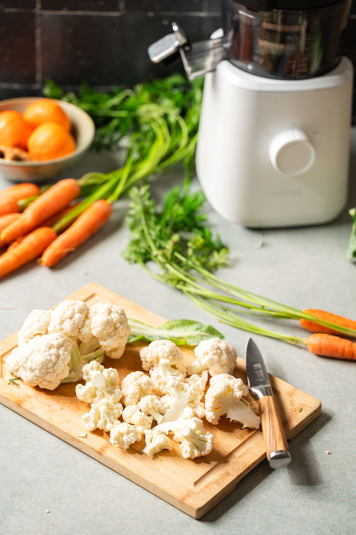 Cauliflower florets on a cutting board