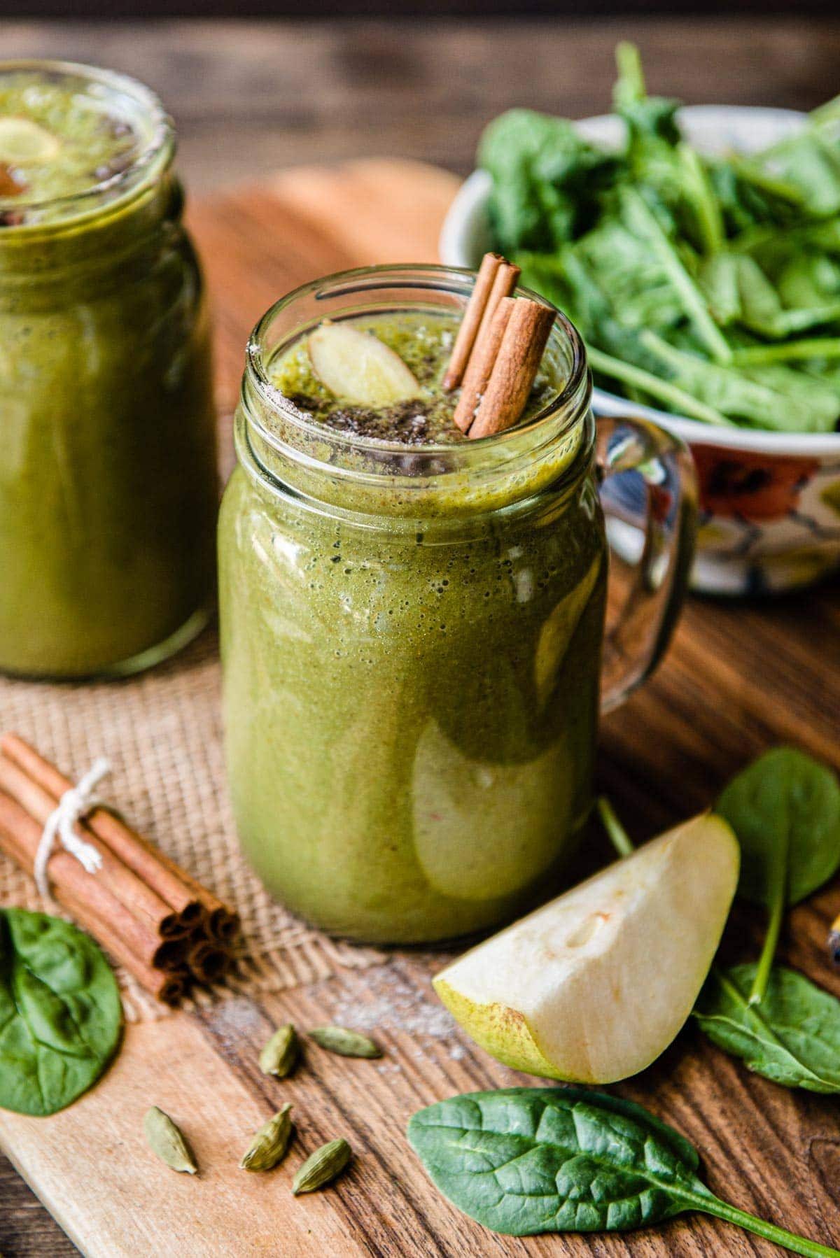 Two warm chai smoothies in mason jars.