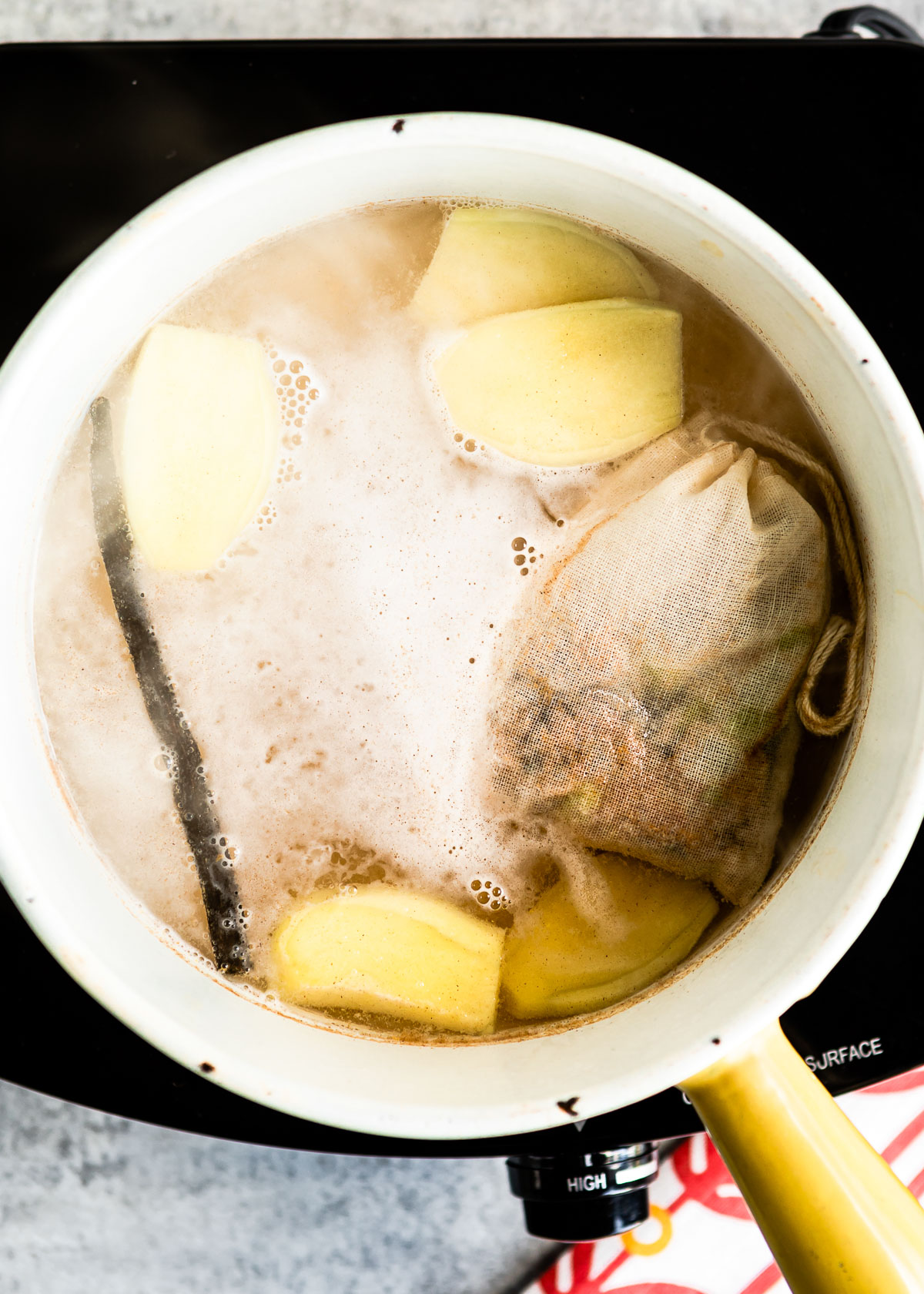 Water getting boiled with spices