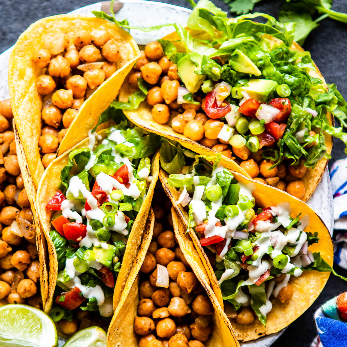 Plate full of crispy chickpea tacos.