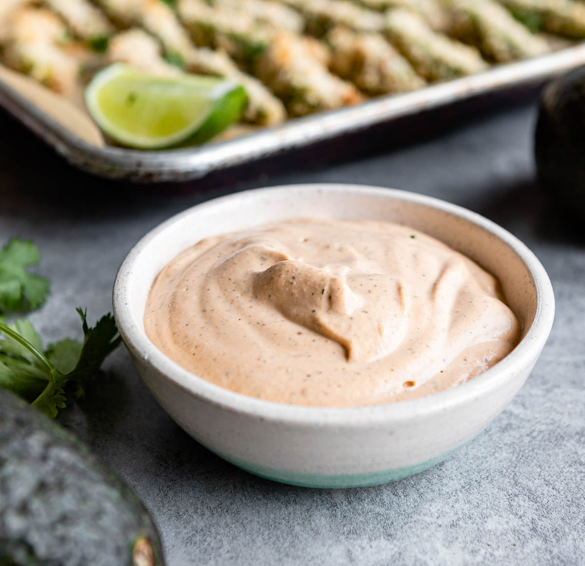chipotle ranch dressing in small white bowl.