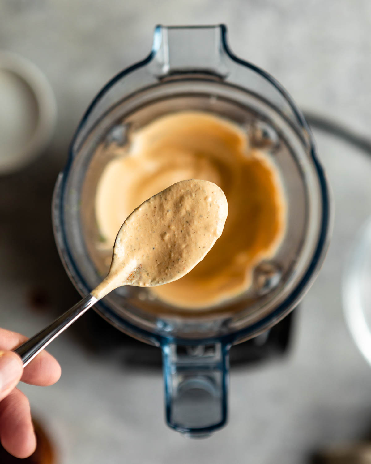 Blended Chipotle ranch dressing on a spoon