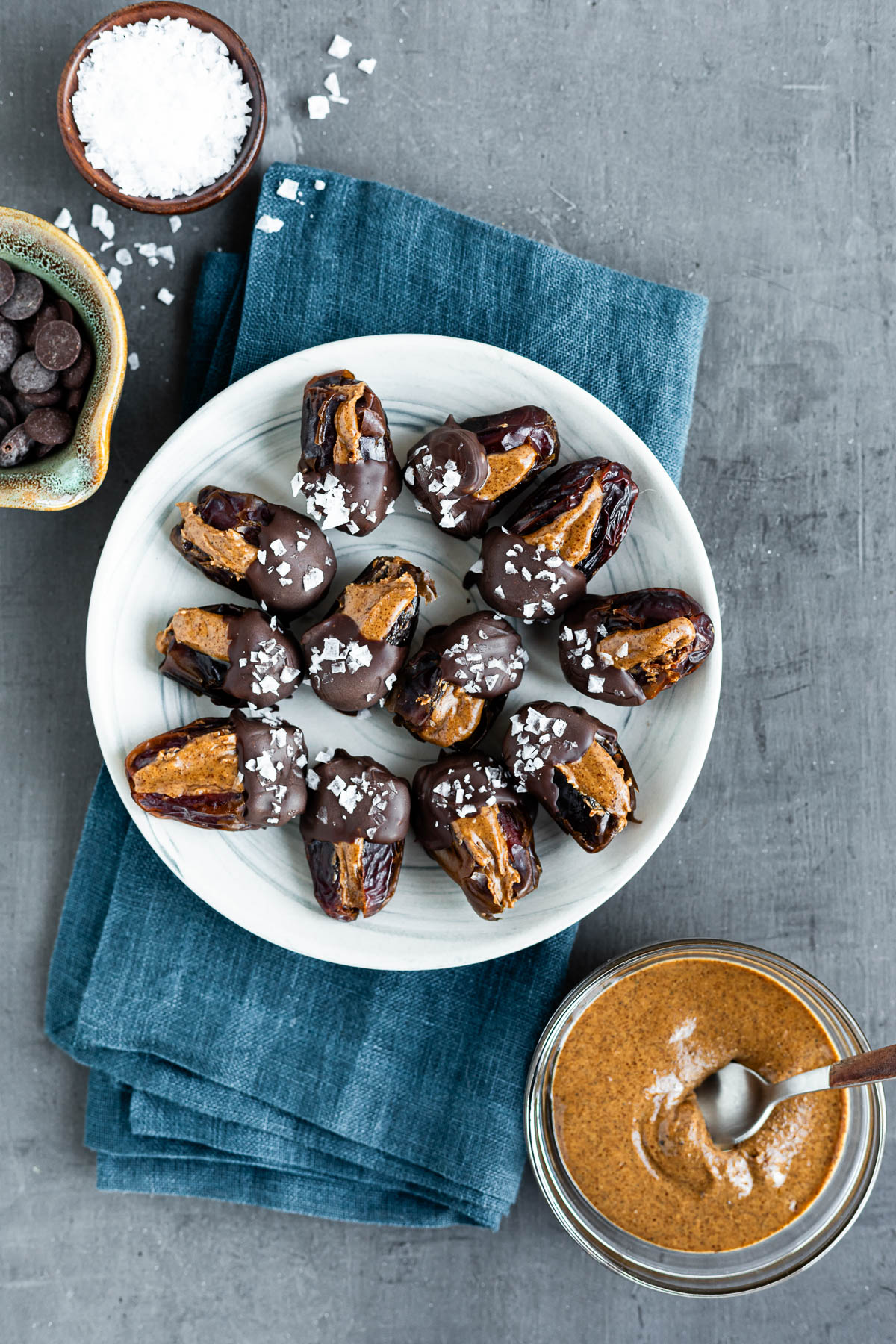 Chocolate covered dates filled with almond butter, sprinkled with sea salt and ready to eat. 