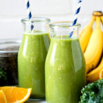 Coconut water smoothie in glass with straw