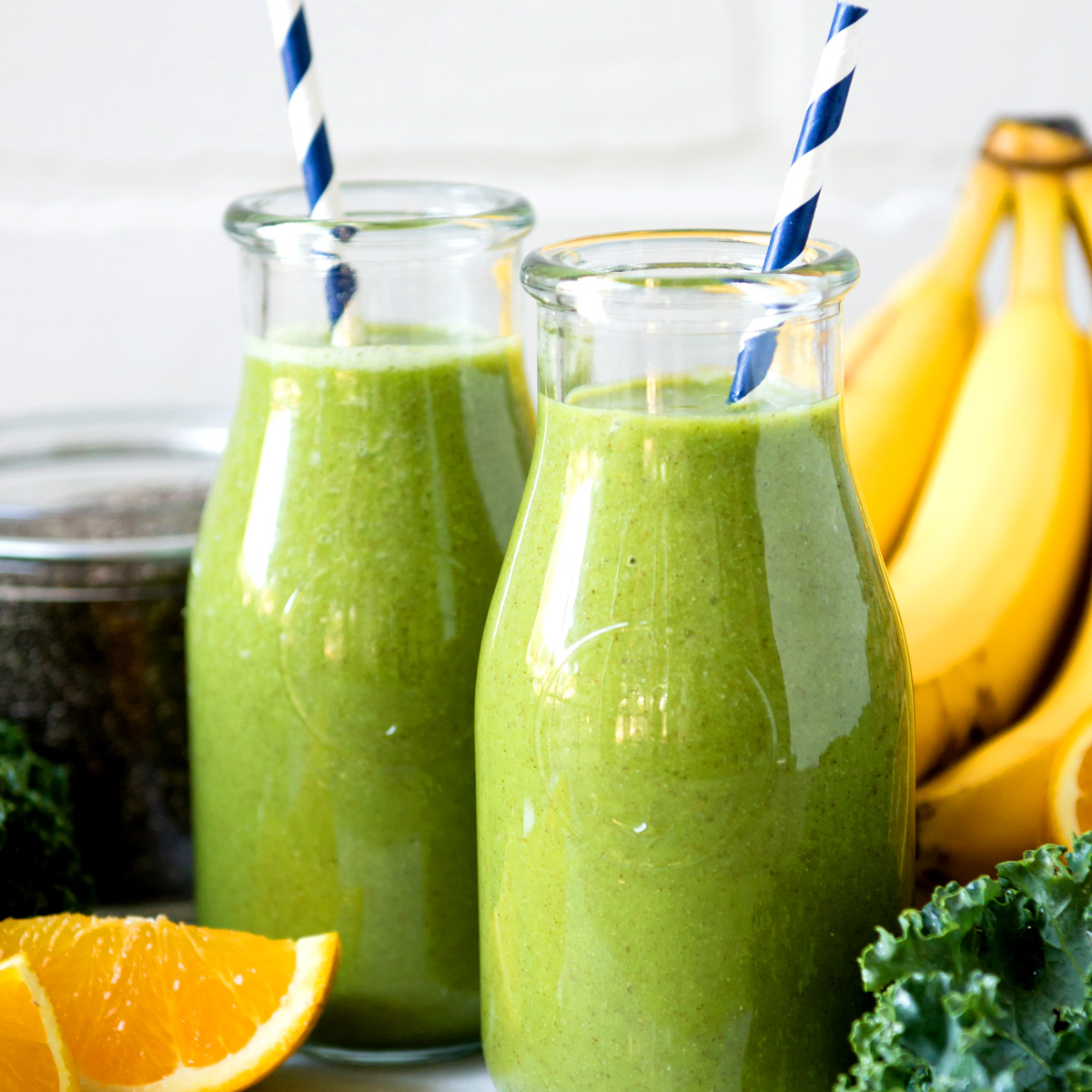Coconut water smoothie in glass with straw