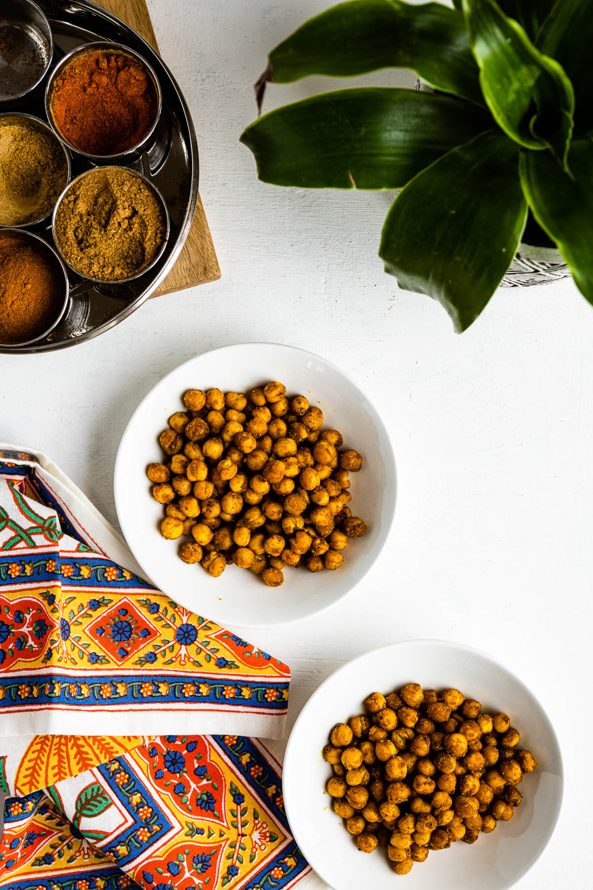 Two bowls of a roasted chickpeas snack to enjoy. 