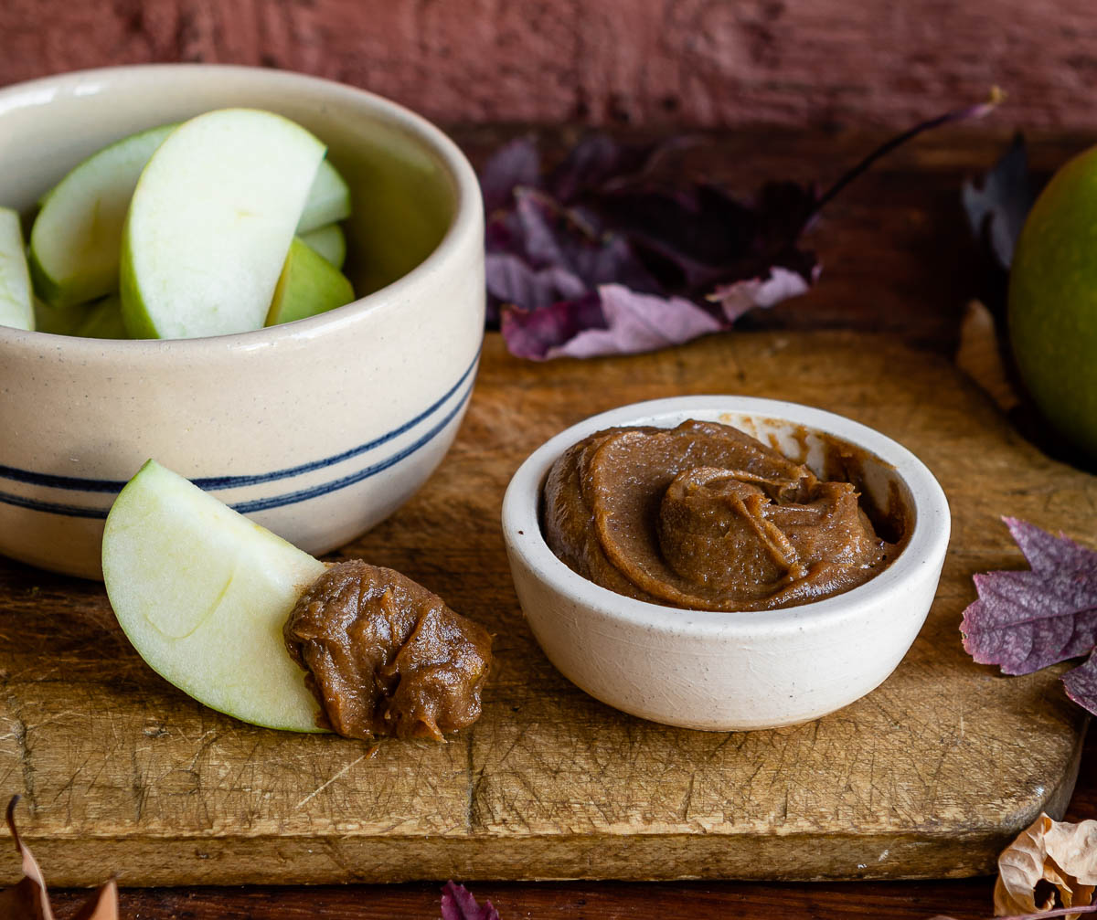 Healthy snack of apple slices paired with a date caramel recipe