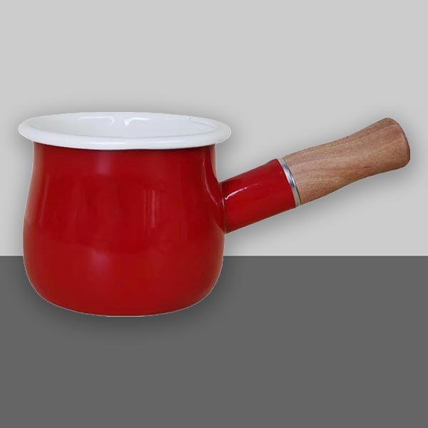 red milk pot on kitchen counter