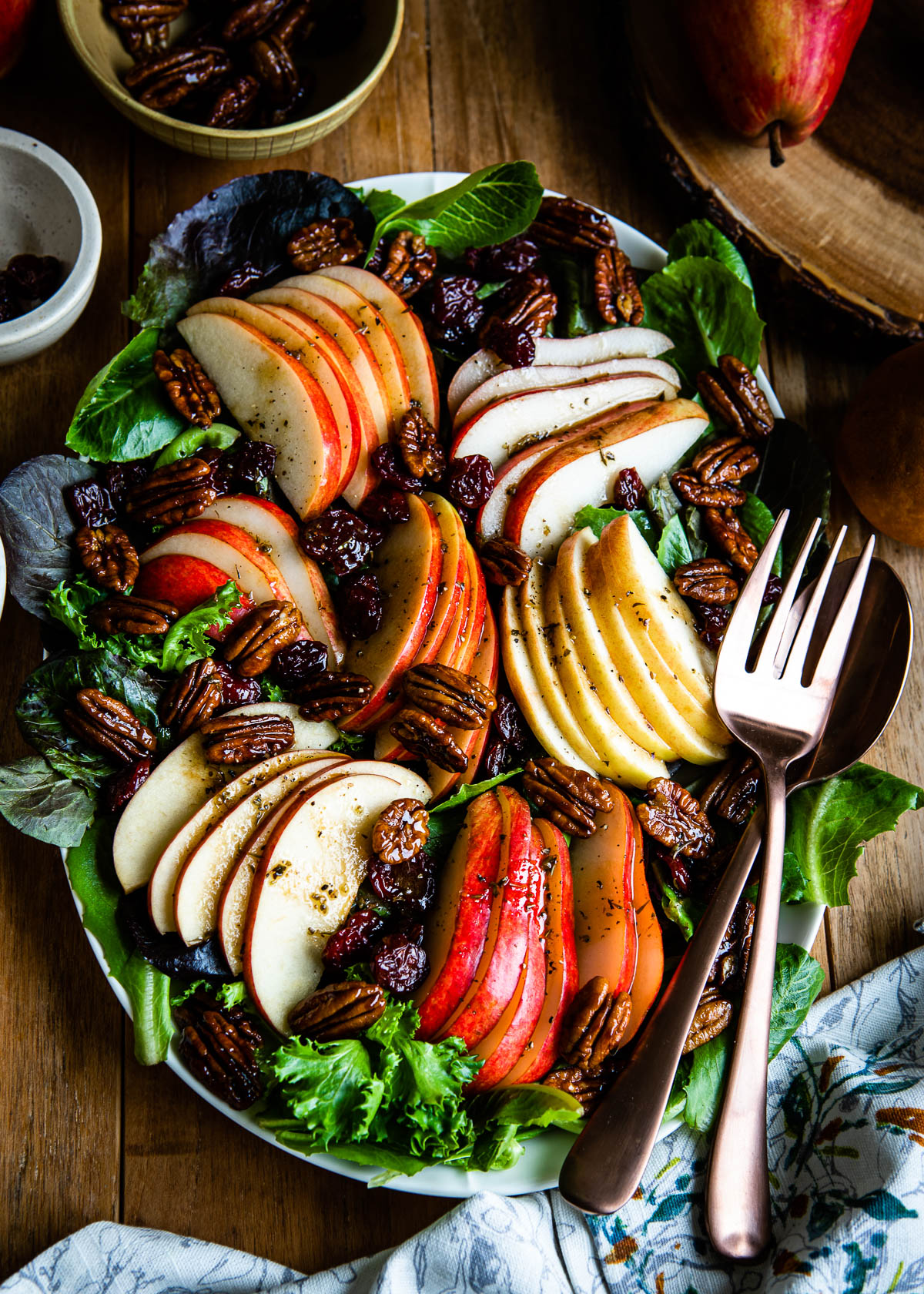 Autumn salad full of apples, pears, dried cherries, candied pecans, mixed greens and an herby vinaigrette.