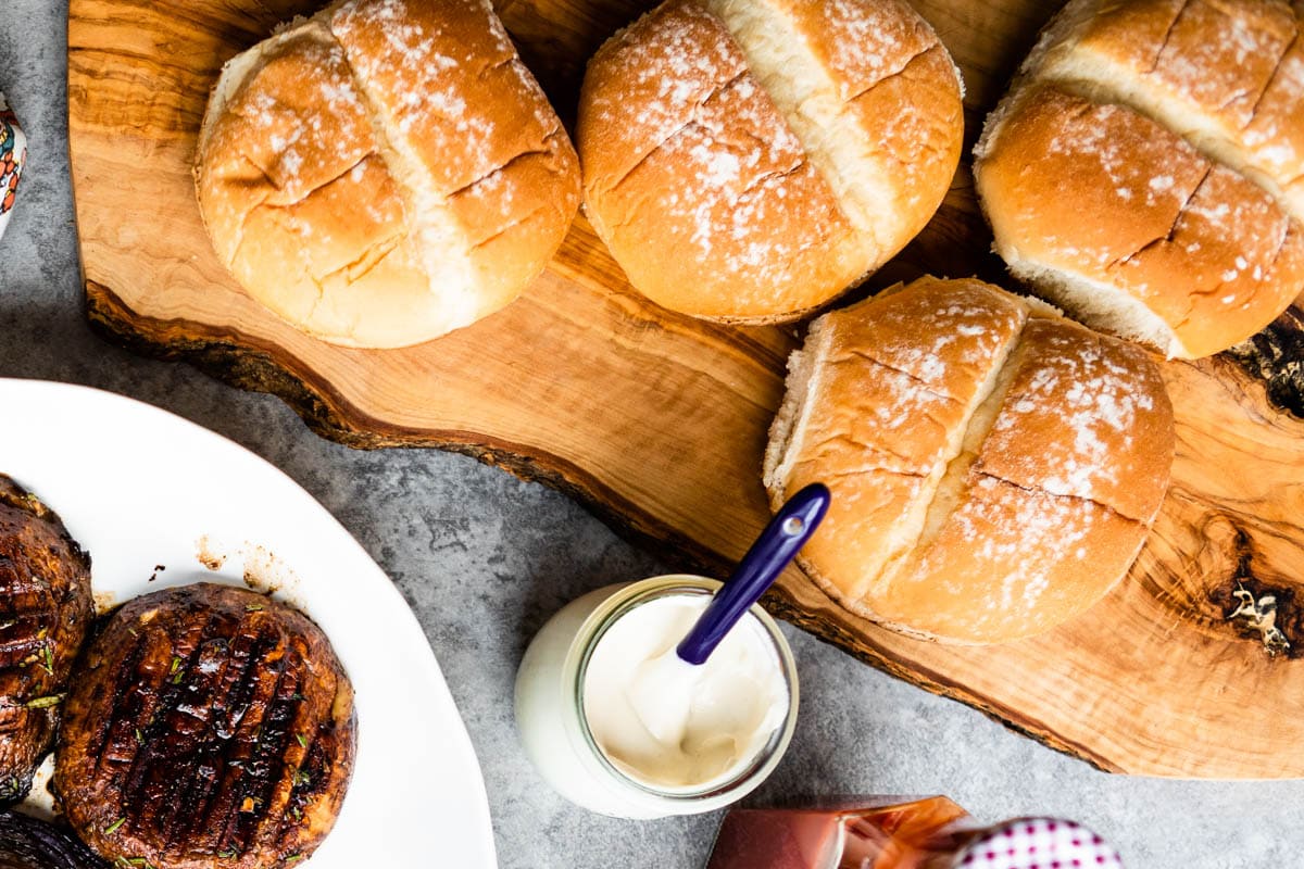 platter of buns and grilled portobello mushrooms.