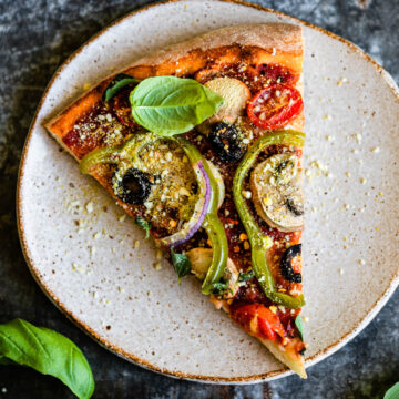 photo of a vegetarian pizza slice as part of our healthy pizza recipes line up