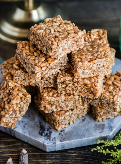 Marble plate with healthy rice crispy treats stacked on top.