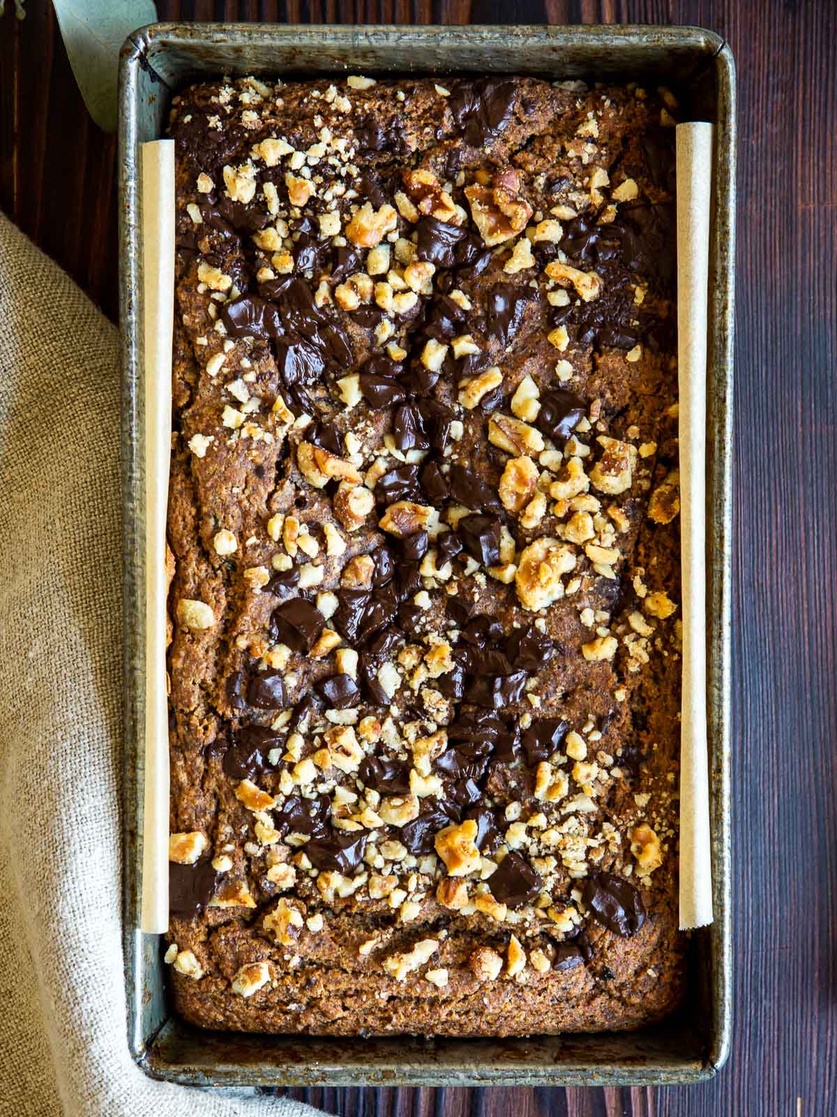 a finished healthy zucchini bread in a loaf pan.