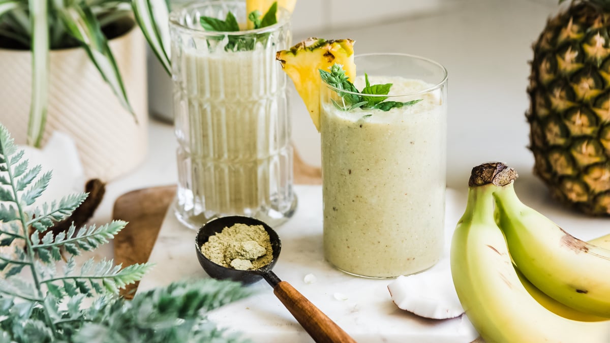 high calorie smoothies in glasses with pineapple and banana