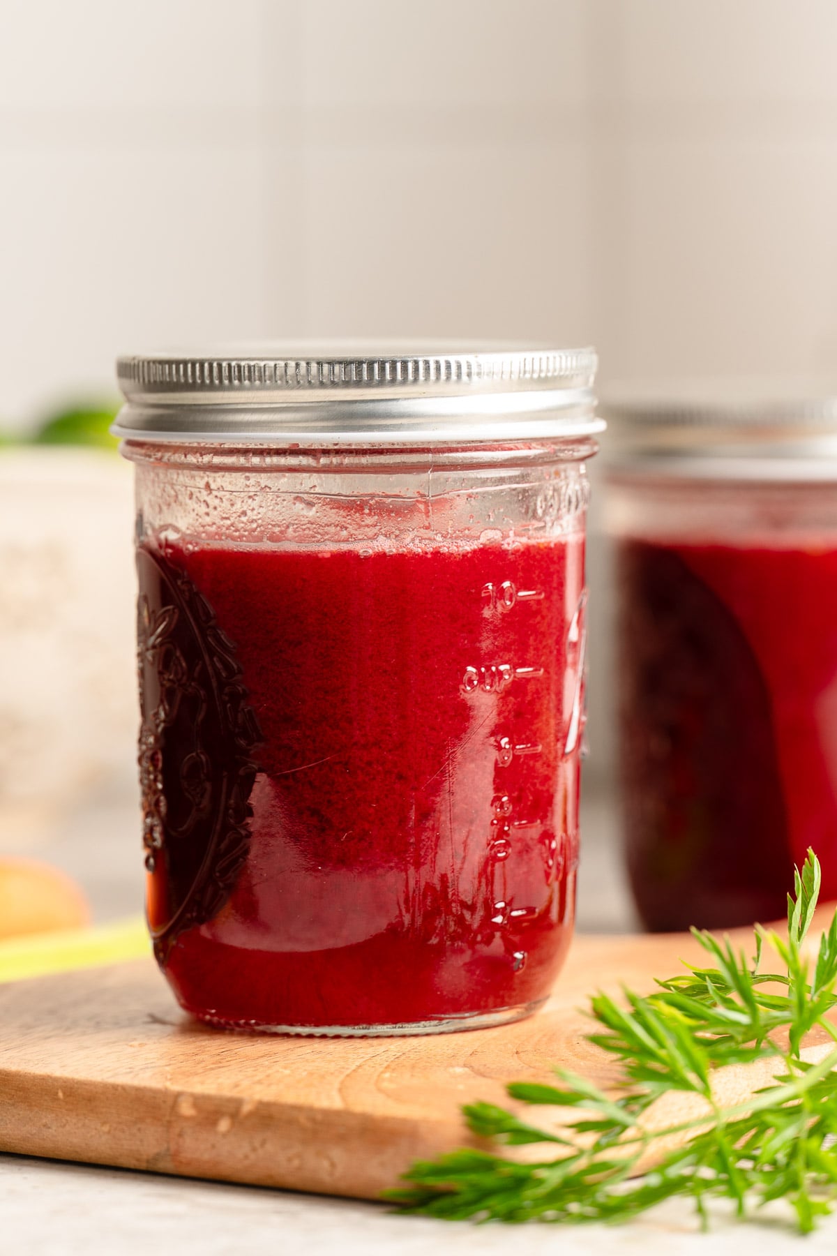 Deep red homemade V8 juice ready to enjoy immediately