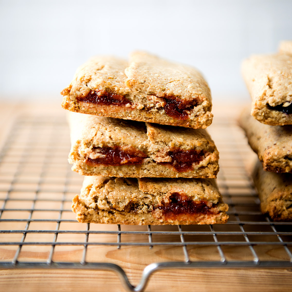 Homemade breakfast bars stacks on wire tray to cool