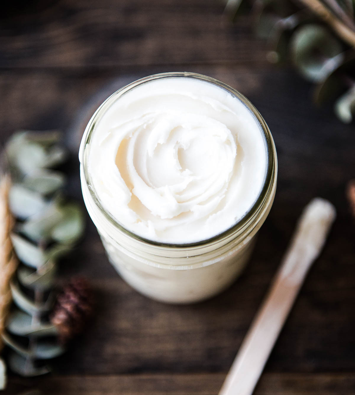 glass jar of white homemade deodorant.