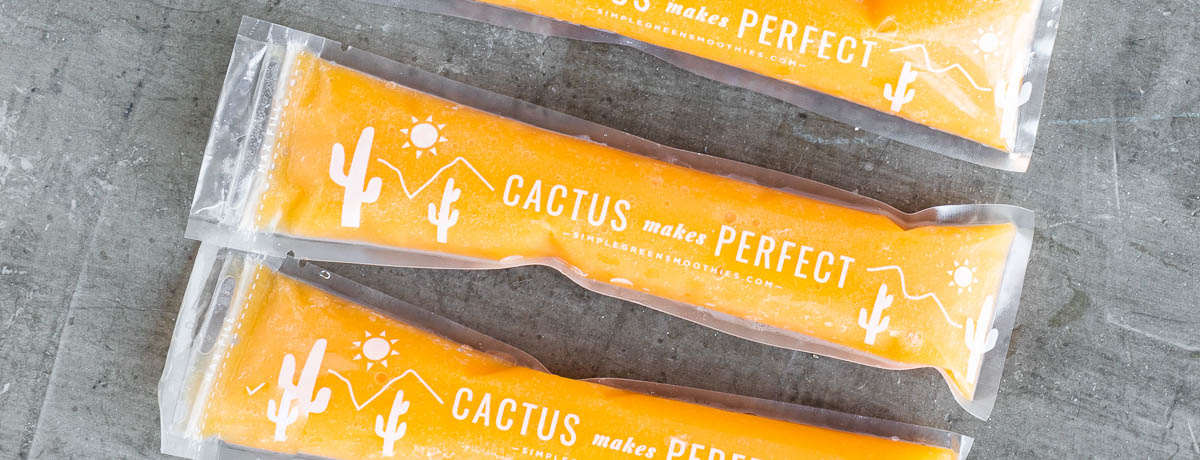 yellow frozen pops in plastic sleeves that say cactus makes perfect.