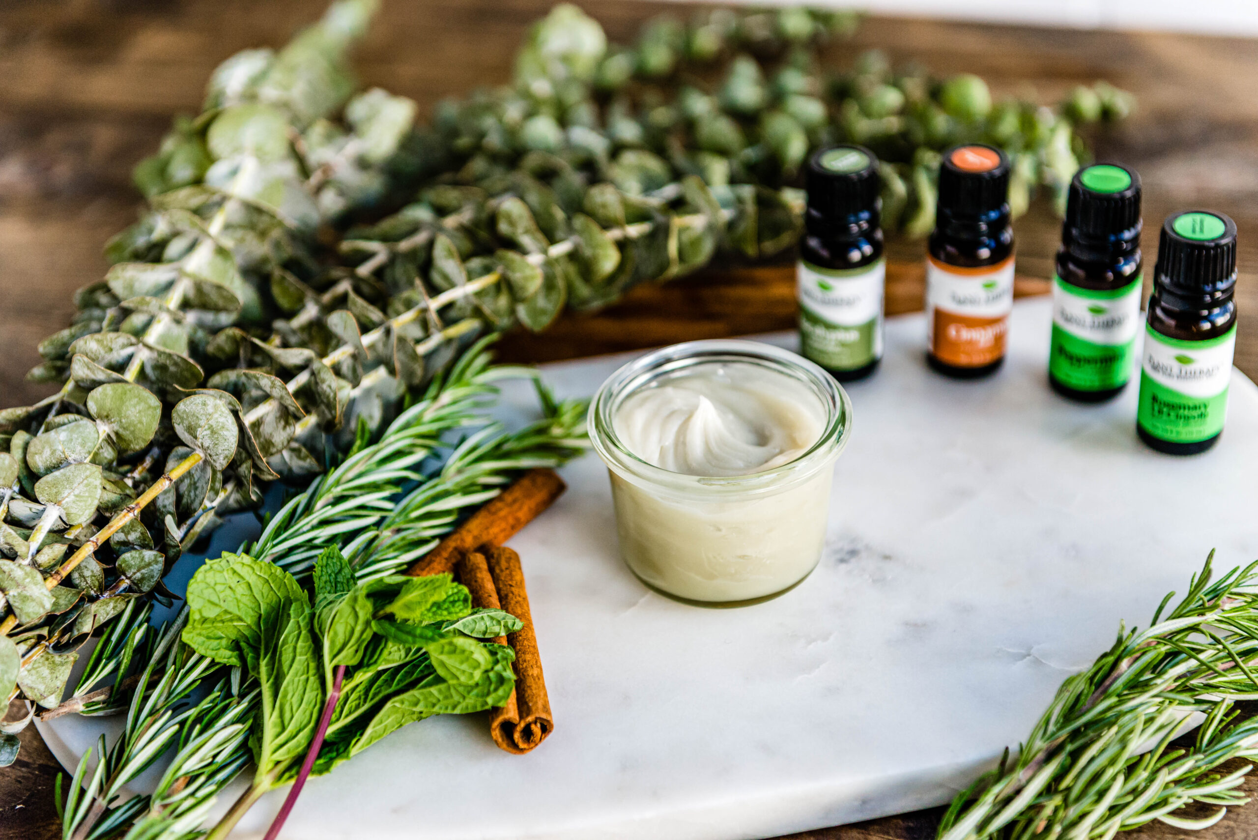 home remedy in glass jar to help open nasal passages that uses essential oils and coconut oil.