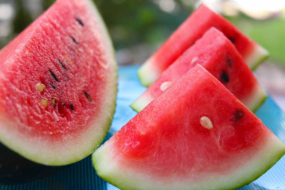 triangle slices of seeded watermelon.