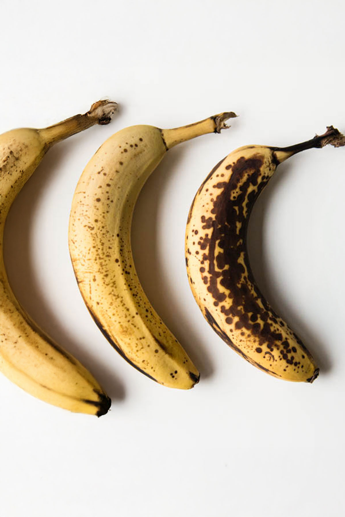 Ripe bananas on a counter