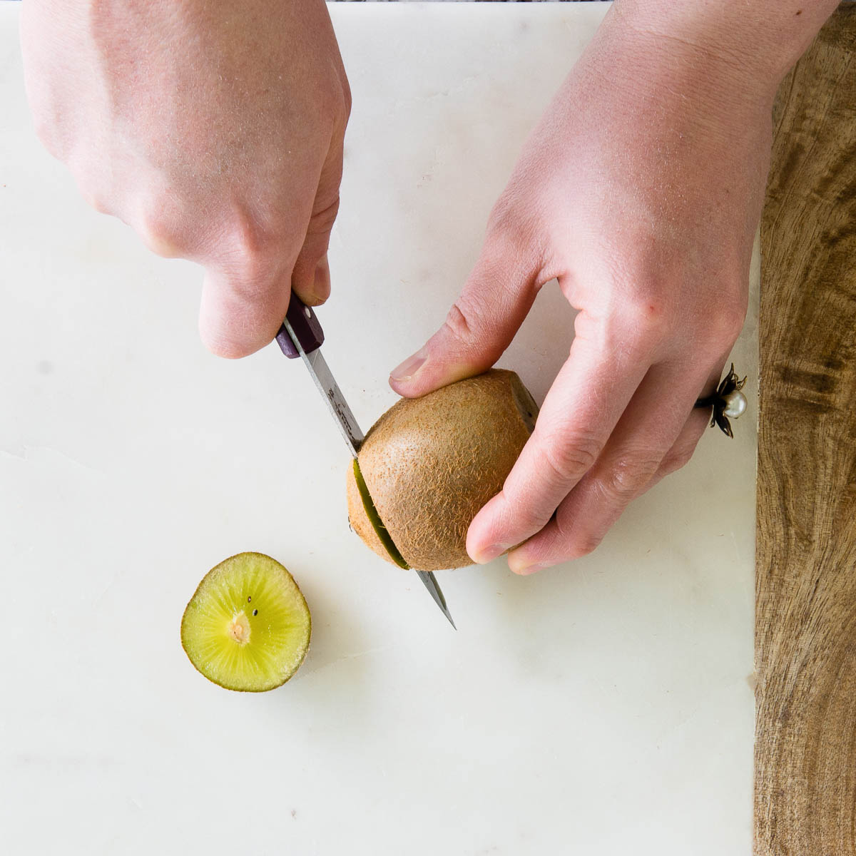 Step-by-step guide on how to peel and cut a kiwi fruit - Virginia Boys  Kitchens