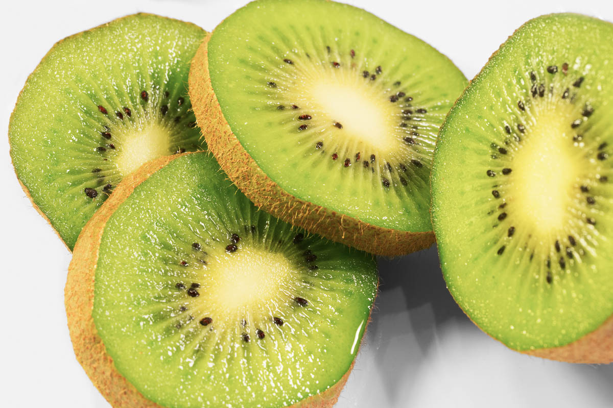 4 slices of kiwi with the skin still on.