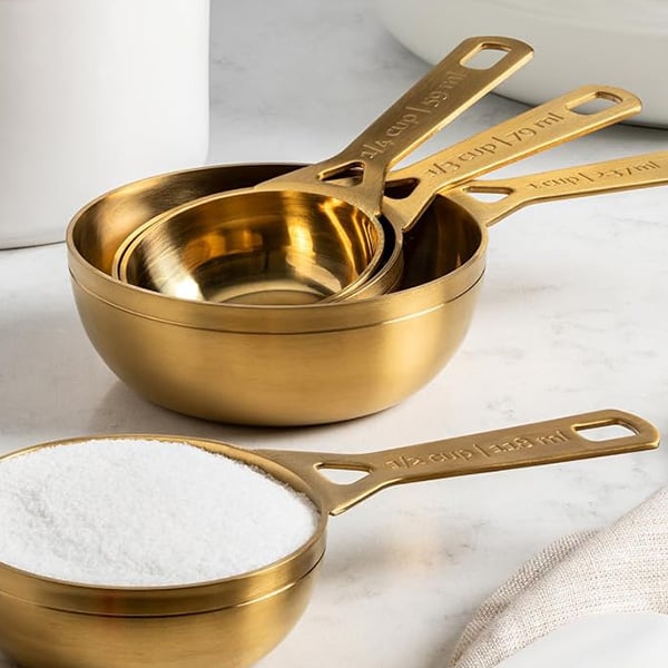 Le Creuset gold measuring cups