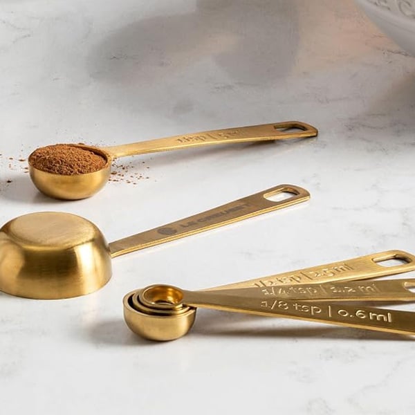 Le Creuset gold measuring spoons