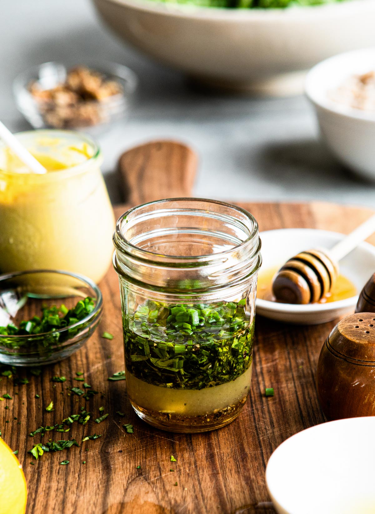 simple tarragon dressing in a small mason jar ready to be shaken up.
