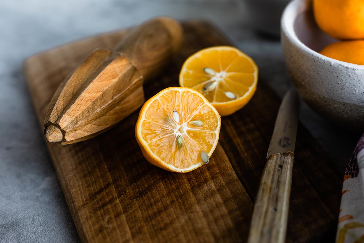 fresh lemons for fresh lemon juice on a wooden board.