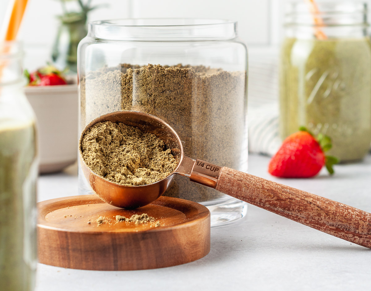 A measuring spoon filled with homemade protein powder
