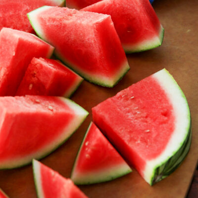 Watermelon slices on a cutting board