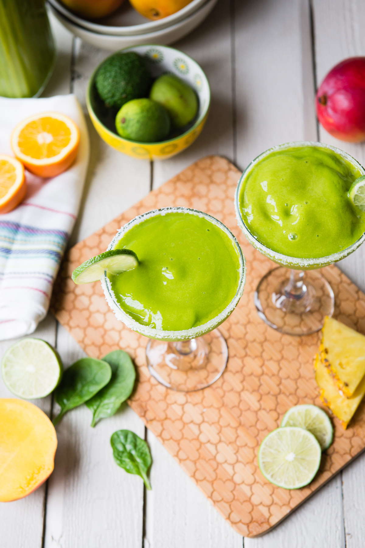Salt rimmed margarita smoothie on table.
