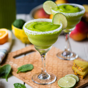 margarita smoothie recipe with lime wedge on rim