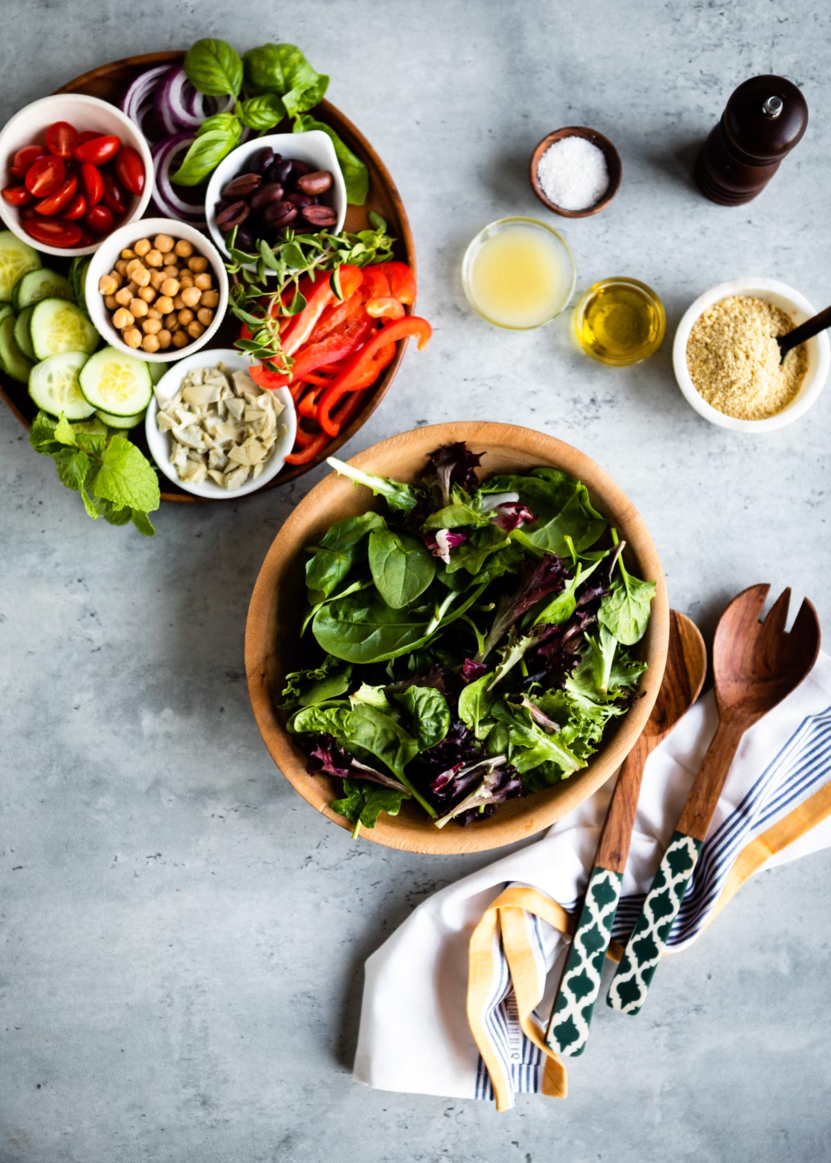 small bowls of ingredients for mediterranean greek salad.