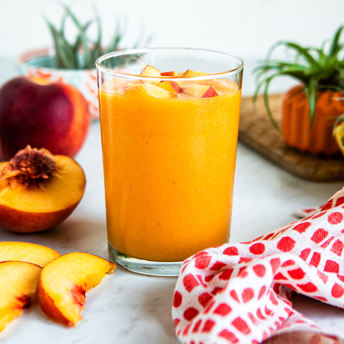 Peach fruit smoothie recipe with banana and orange.