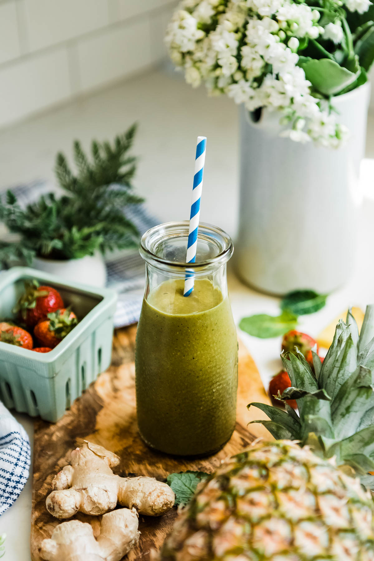 A creamy pineapple ginger smoothie on the counter. 