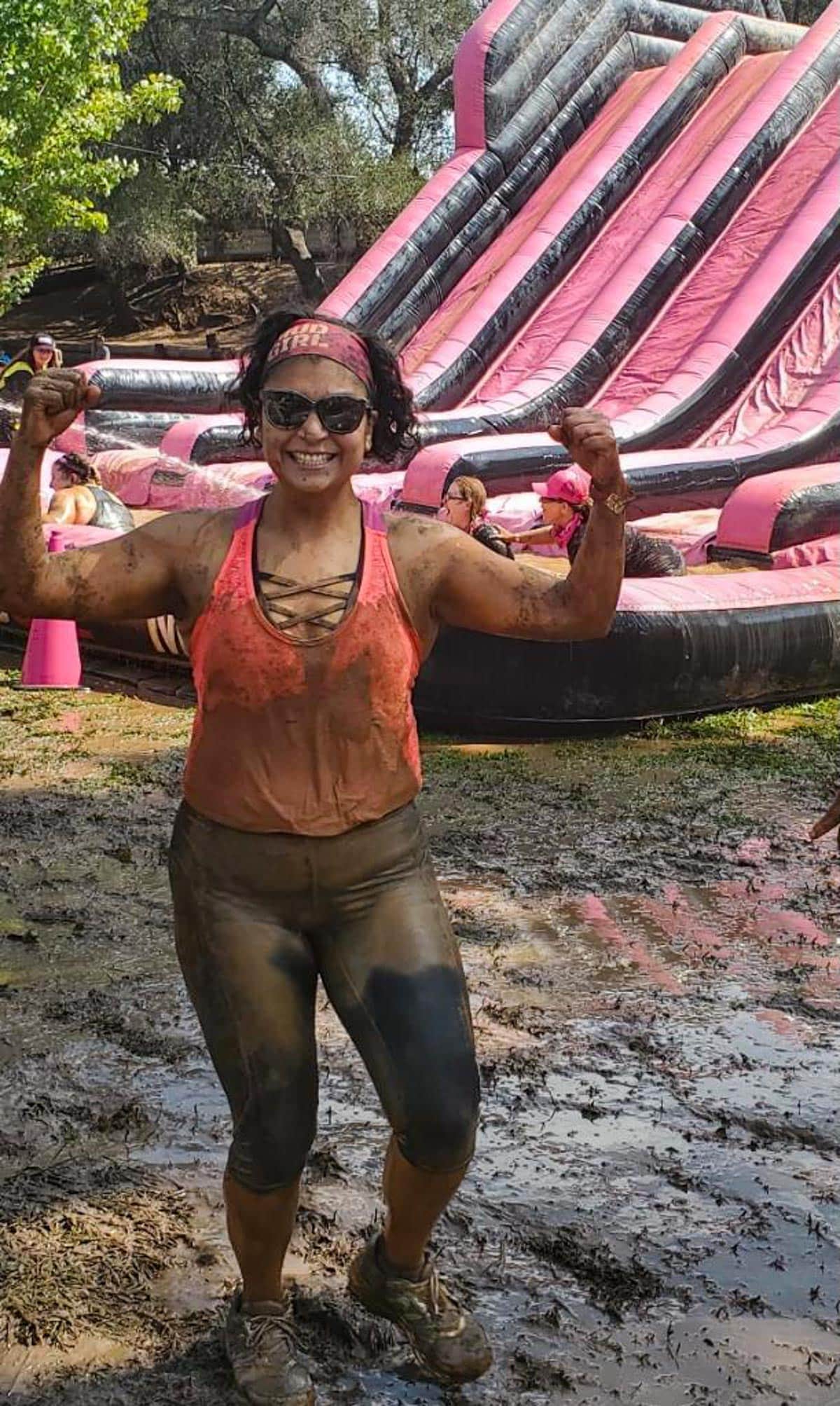 person in the middle of a mud run