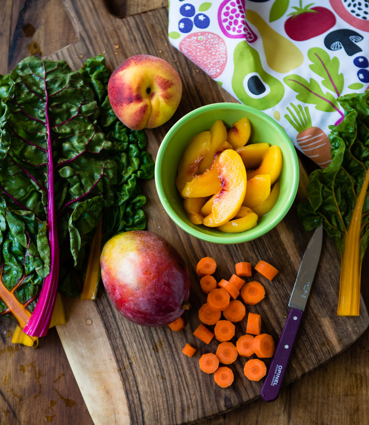 Ingredients used in the pregnancy smoothie on wood cutting board.